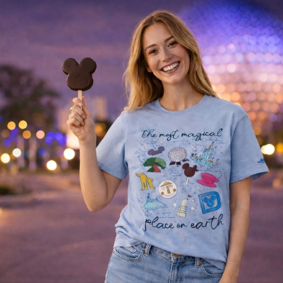 Walt Disney Tops - Disney Parks t-shirt featuring the slogan "The Most Magical Place on Earth" Blue